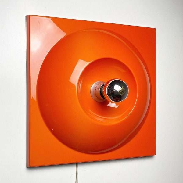 Super rare orange wall lamp made in Germany 1970s.