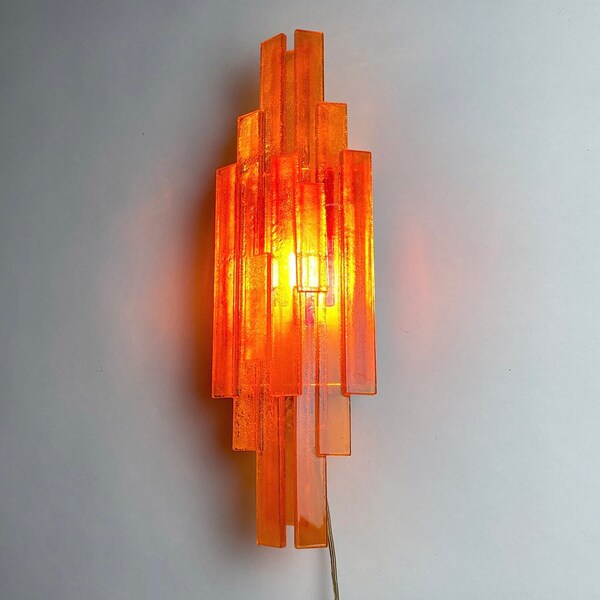 Beautiful and rare space age wall light by Claus Bolby, Denmark 1960s.