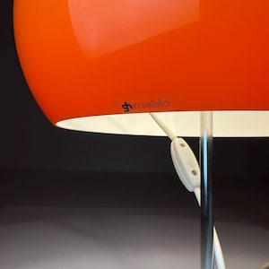 classic large orange Harvey Guzzini table, Italy 1970s.