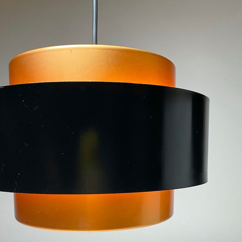 Closeup of Classic danish Juno copper ceiling light by Jo Hammerborg for Fog and Morup, Denmark 1966.