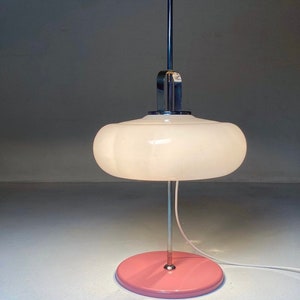 Reserve Beautiful table lamp by Harvey Guzzini made in Italy 1970s.