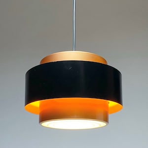 Another angle of the Classic danish Juno copper ceiling light by Jo Hammerborg for Fog and Morup, Denmark 1966.