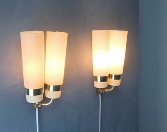 Midcentury modern set of brass and teak sconces by Yahsa Heifetz for Rotaflex, France 1950s.