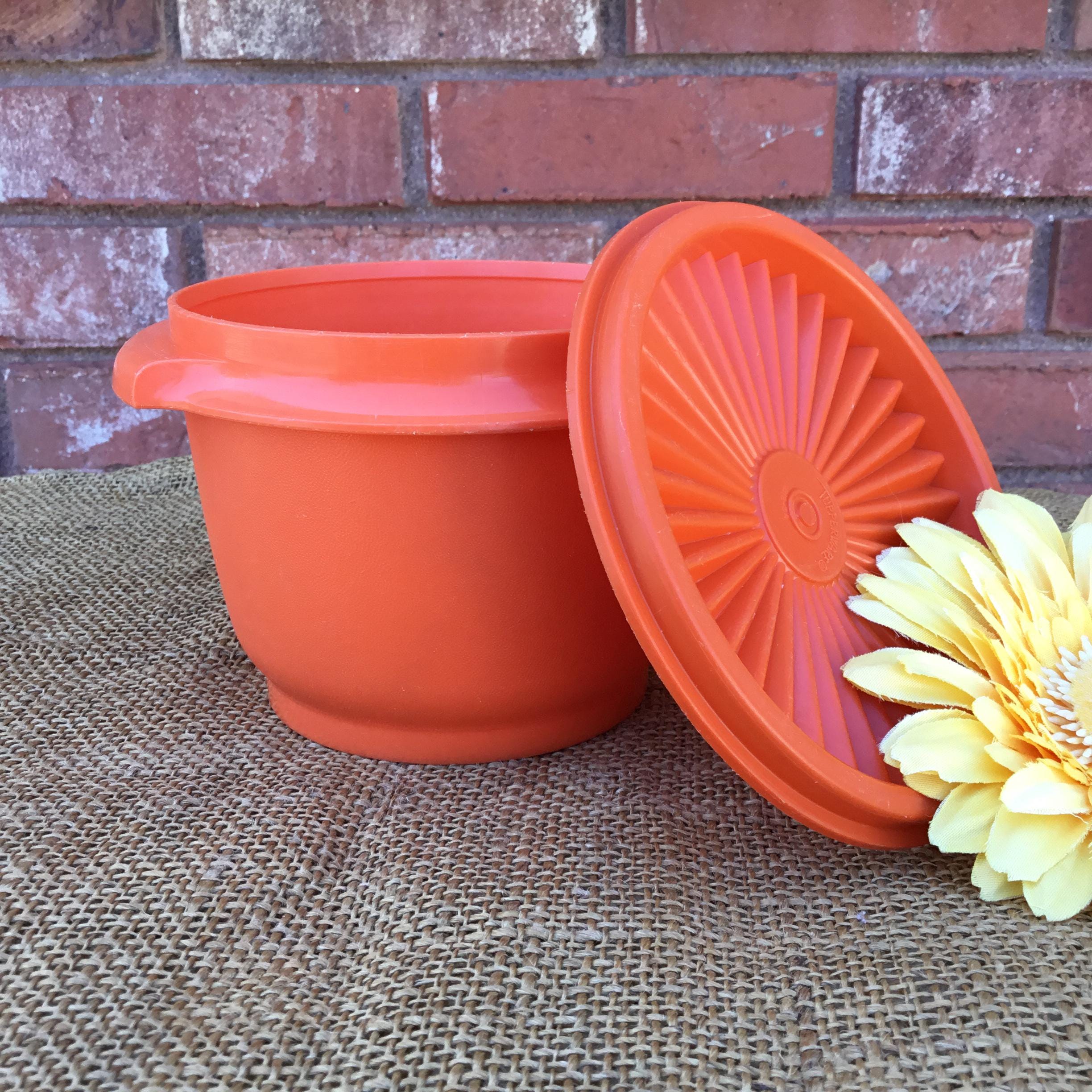 Vintage orange Tupperware Servalier with lid  | #886-21 | 1980’s | 5” wide x 3 3/4” high