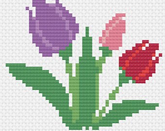 May include: A cross-stitch pattern of three tulips in purple, pink, and red with green leaves.