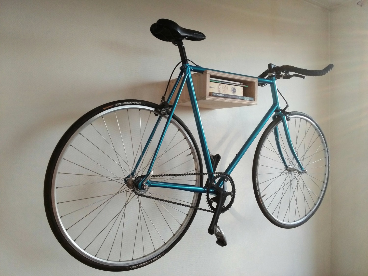Basic wooden bike rack. Small bike storage Wall mounted bike