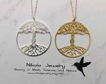 May include: Two silver and gold necklaces with a tree of life pendant featuring a DNA strand. The pendant is a circle with a detailed tree design. The necklaces are on a white marble background. The text "Nikola Jewelry Beauty in Math, Science, and Nature www.nikolajewelry.etsy.com" is below the necklaces.