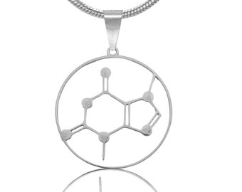 May include: A silver necklace with a circular pendant featuring a stylized chemical structure of caffeine.