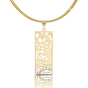 May include: A gold chain necklace with a pendant shaped like a circuit board. The pendant is a rectangular shape with a detailed design of electronic circuitry.