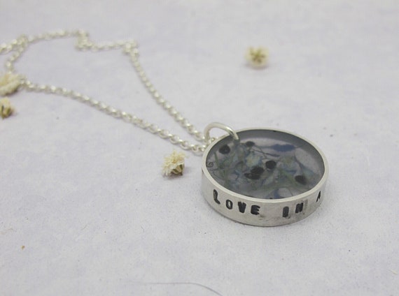 Resin and recycled silver long pendant with pressed flowers, petals and seeds from Nigella plant/love in a mist