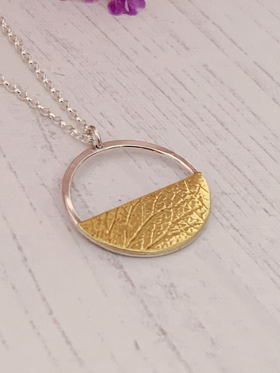 Long recycled silver circle necklace with semi circle/half moon silver or brass patterned petal leaf imprint