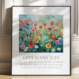 Könnte beinhalten: Ein gerahmter Kunstdruck mit einem Aquarellgemälde von bunten Blumen in einem Feld. Das Kunstwerk zeigt rote, orangefarbene, rosa, lila und gelbe Blüten. Der Text "EPHESIANS 3:20" und ein Bibelvers sind darunter gedruckt.