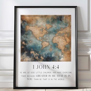 May include: Framed digital print featuring a vintage-style world map in shades of brown and blue. The print includes the text "1 John 4:4" and a related Bible verse. The artwork is displayed in a black frame.