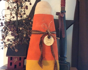 Large primitive candy corn shelf sitter