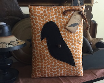 Pumpkin pillow with crow