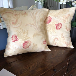 One Handmade reversible cushion cover in Laura Ashley Baroque Raspberry Fabric.