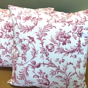 One Handmade cushion in Laura Ashley Ironwork scroll cranberry