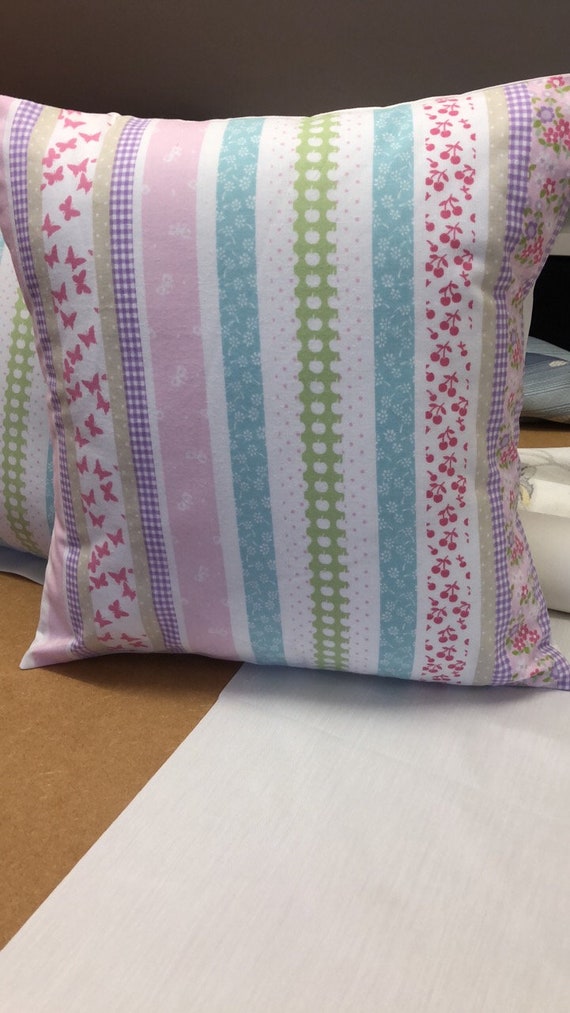 TWO LAURA ASHLEY HANDMADE CUSHIONS IN WILD MEADOW MULTI COLOURS FABRIC