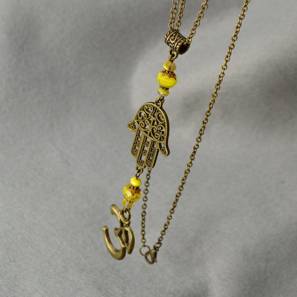 Golden Aura: Bronze Chain Necklace Adorned with Yellow Glass Beads and Spiritual Pendants