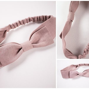May include: A dusty rose fabric headband with a bow. The headband is elastic and has a simple design.
