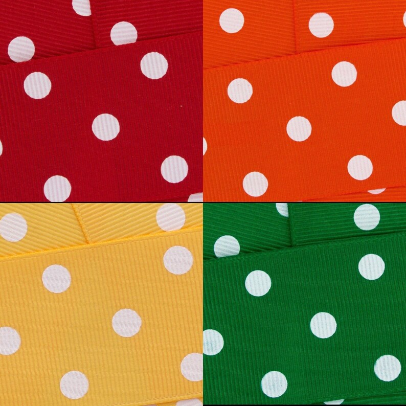 May include: Four different coloured ribbons with white polka dots. The ribbons are red, orange, yellow, and green.