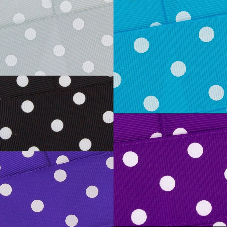 May include: Four different colours of ribbon with white polka dots. The colours are light grey, turquoise, black, and purple.