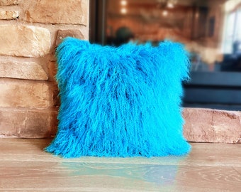 turquoise fluffy pillows