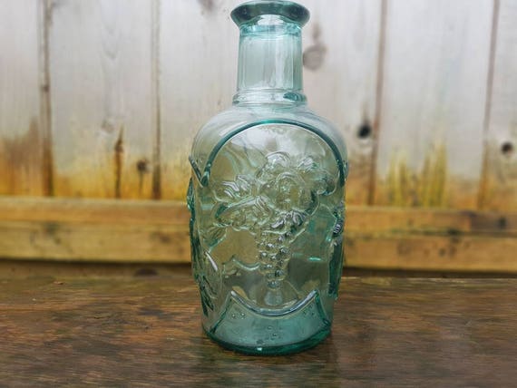 Vintage 1940s Heavy Green Glass Bottle Embossed fruit medley  nostalgic decor Canada 4" × 8.5" no cork cherries pear grapes & apple No. 3