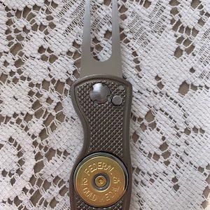 12 GA divot golf tool