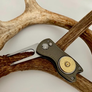 12 GA divot golf tool