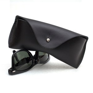 Black leather sunglass case for most glasses sizes