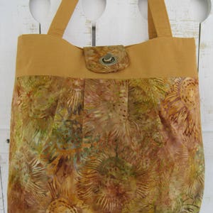 Handbag, Fabric, Purse, Batik Sunflower print,  gold/bronze multi color, pleated, twist lock,  handmade, fashion accessory,