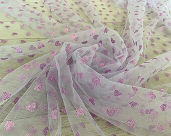 light purple tulle fabric with glitter hearts