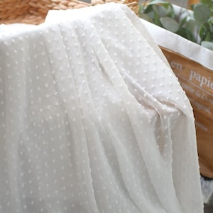 Chiffon fabric with 3d polka dots