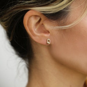 dainty organic natural 14k yellow gold tiny stud earrings by lacuna jewelry