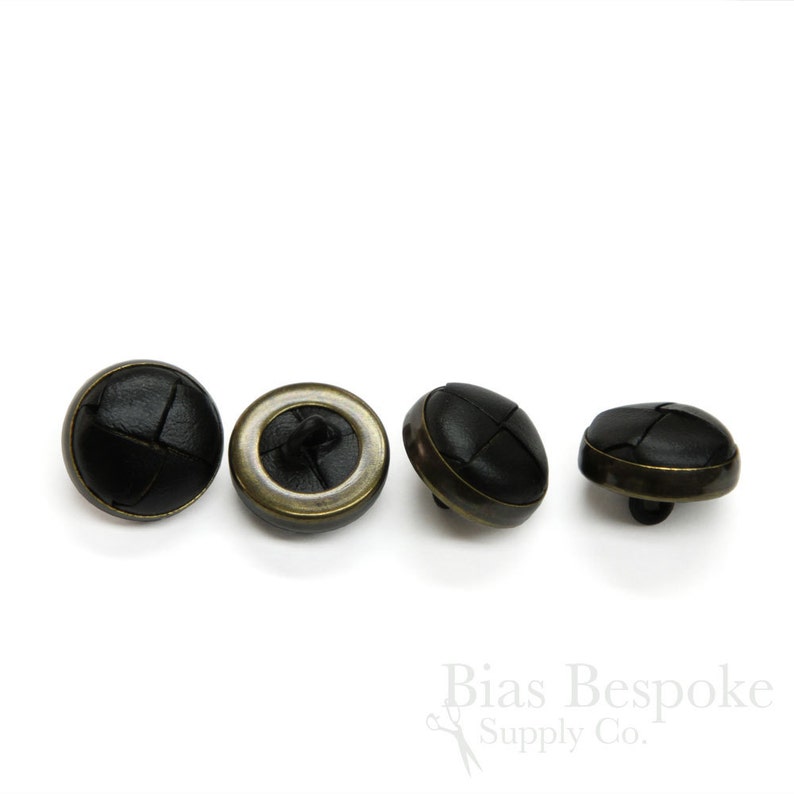 May include: Four black leather buttons with a brass rim. The buttons have a woven pattern and are suitable for sewing onto clothing.