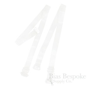 May include: Two clear, adjustable bra straps with plastic hardware. The straps are made of a transparent material and are designed to be discreet under clothing. The straps have a hook and loop closure for easy adjustment and attachment.