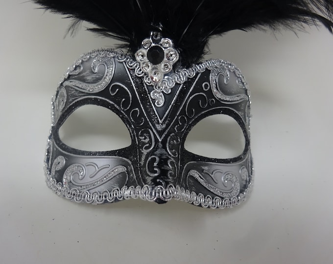 Ladies Black and Silver Masquerade Carnival Mask with Long Feathers and Centre Jewel