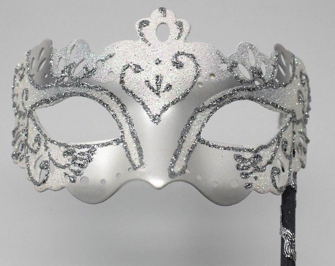 White and Silver Mask on a Silver Stick