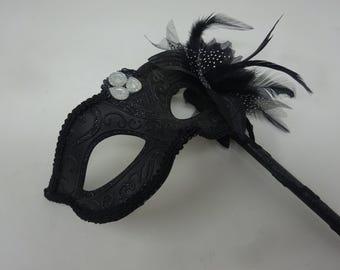Stunning Black Jewelled Masquerade Mask on a Black Stick with a Flower and Feathers