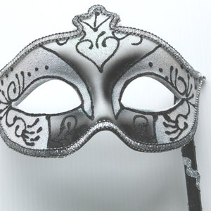 White and Silver Mask on Stick