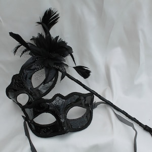Black His and Hers Couples Masquerade Masks on a Black Stick