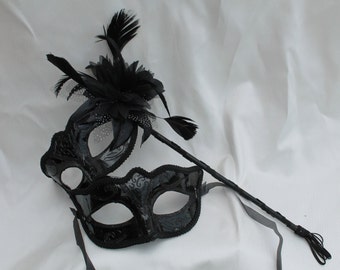 Black His and Hers Couples Masquerade Masks on a Black Stick