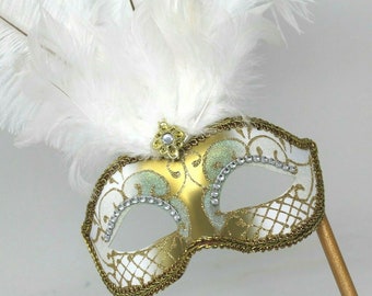 White and Gold Feather Masquerade Mask on a Gold Stick with Diamontes