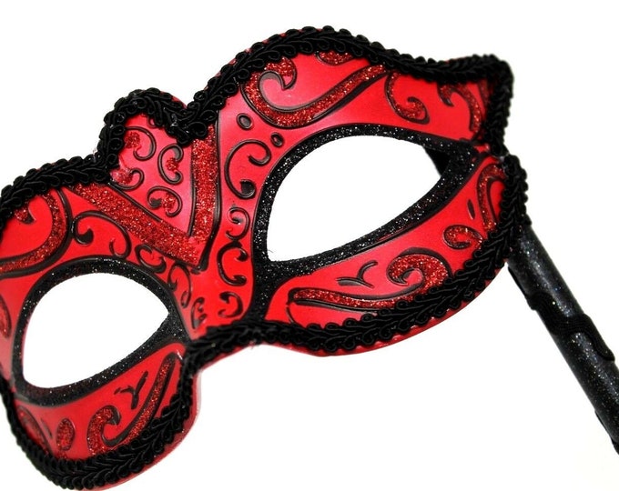 Red and Black Masquerade Mask on a Black Stick