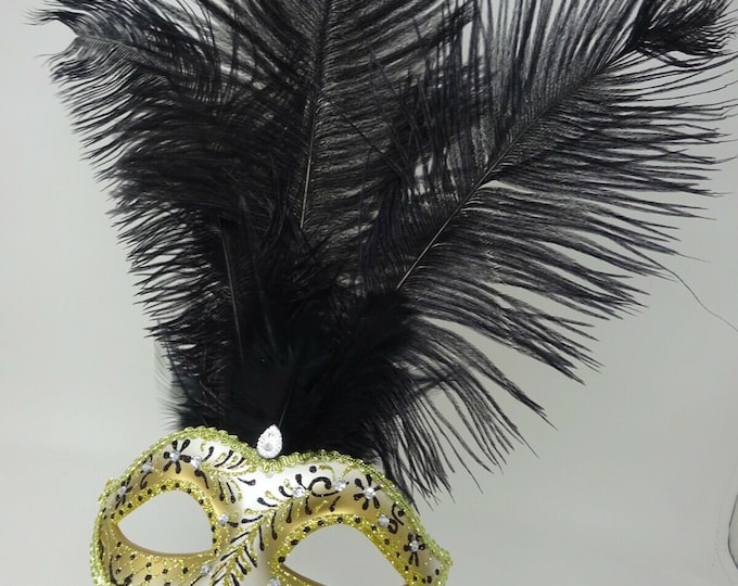 Stunning Black and Gold Feather Masquerade Mask with Clear Diamontes Hand Held on a Black Stick