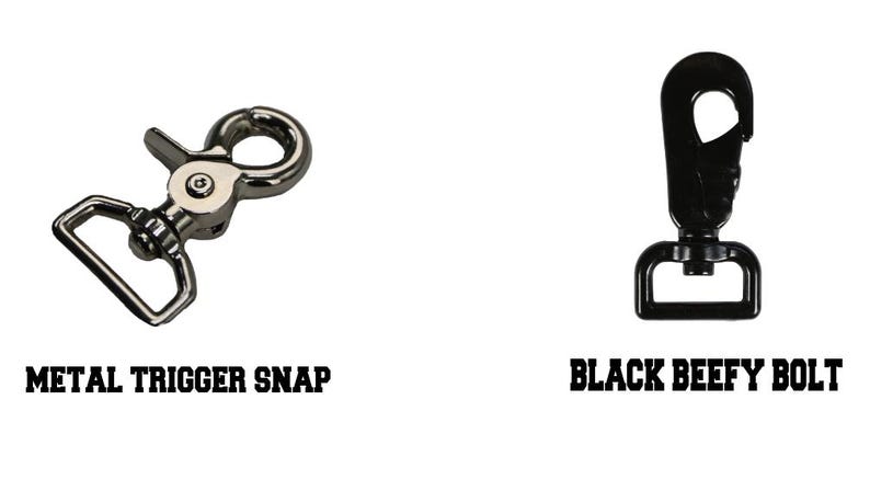 May include: Two metal clasps, one silver and one black. The silver clasp is labelled "Metal Trigger Snap" and the black clasp is labelled "Black Beefy Bolt".