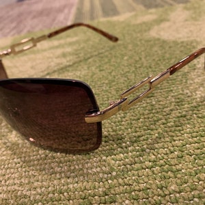 Nine West Oversized Cat-Eye Sunglasses with Accessories original price  $49.99