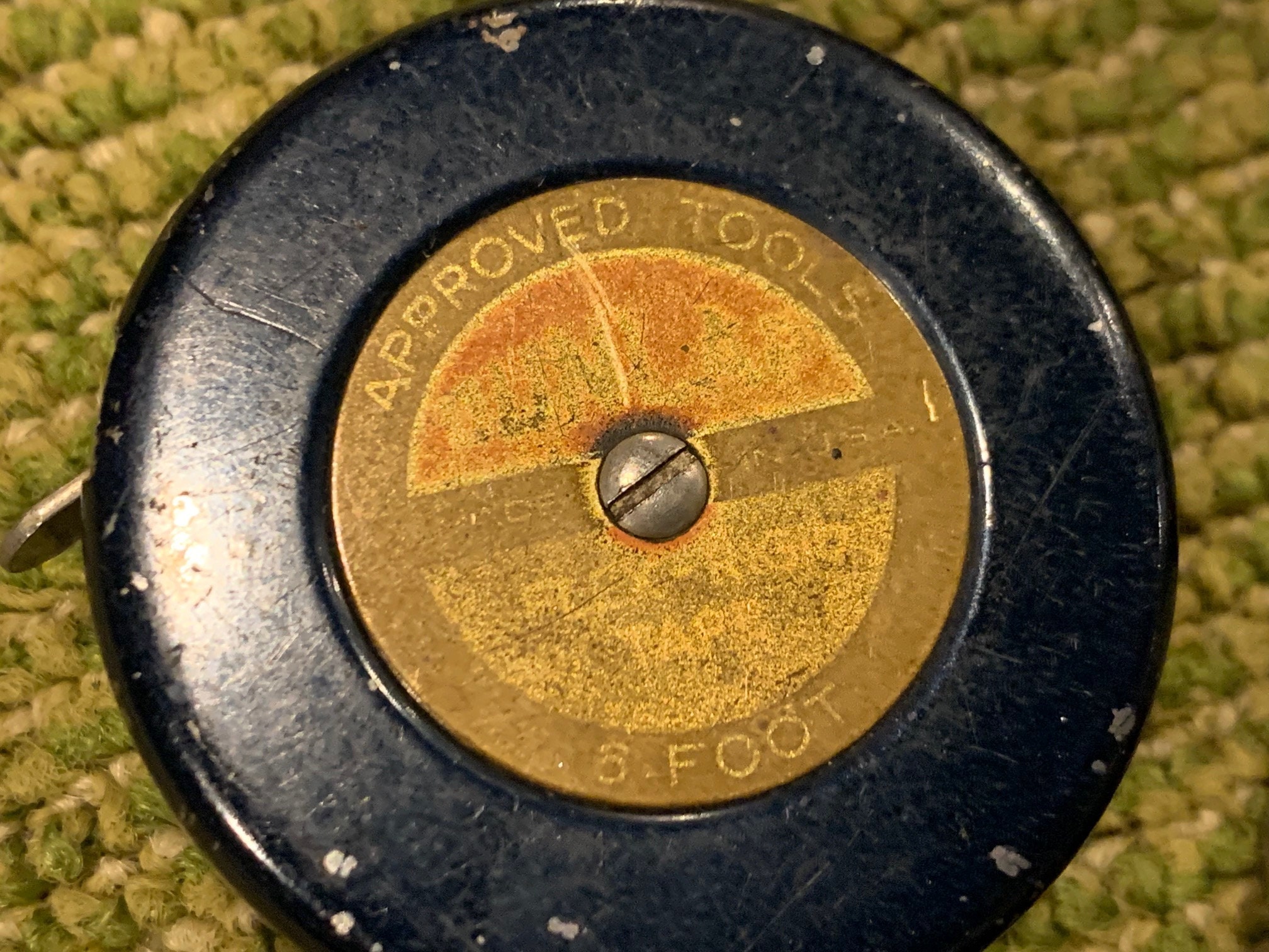 I was blowing the dust off my older craftsman tape measure only to reveal  the original factory sticker, new sticker that was on at the time of  purchase just mentions the magnet