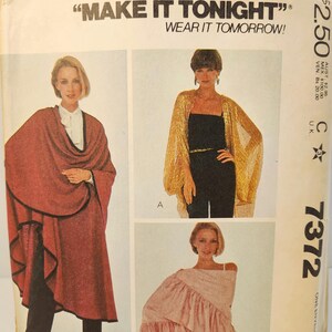 May include: A sewing pattern for three different styles of shawls. The pattern is from McCall's and is called "Make It Tonight" Wear It Tomorrow!" The pattern number is 7372.